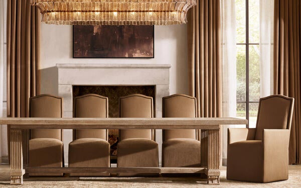 Mayfair table in Bisque, shown with Alexandria camelback dining chairs