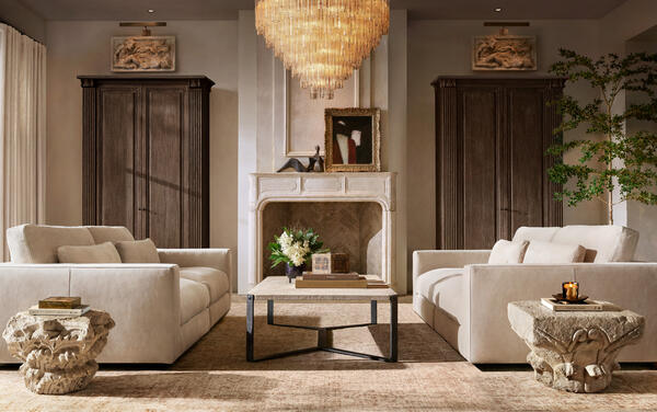 Lugano sofa in Ivory Italian Varenna leather, shown with the Flatiron coffee table