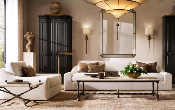 Jennifer low-back sofa in Natural performance washed linen, shown with the Baldacchino coffee table