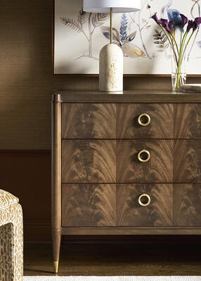 Distinguished by its stunning mahogany veneers, the Rendition dresser complements any space