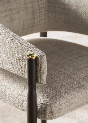 The Rendition dining armchair combines a timeless silhouette with fresh styling