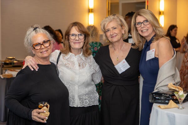 Ruth Reiner, Joanne Adams from sponsor Exceptional Flooring
Concepts, Kristine Altman and Dawn Chioda
