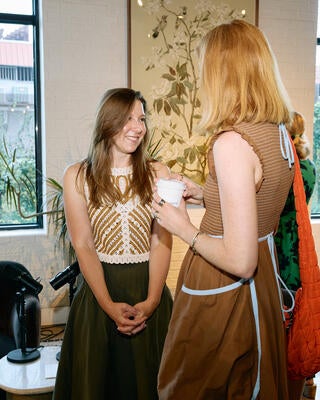 Kaitlin Petersen mingles with guests following the panel