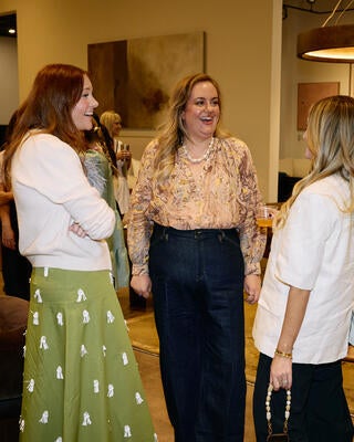 Anastasia Casey (center) of IDCO Studio connects with Melissa Oholendt and Audrey Scheck 