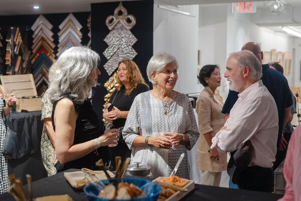 Robyn Pocker socializing with guests