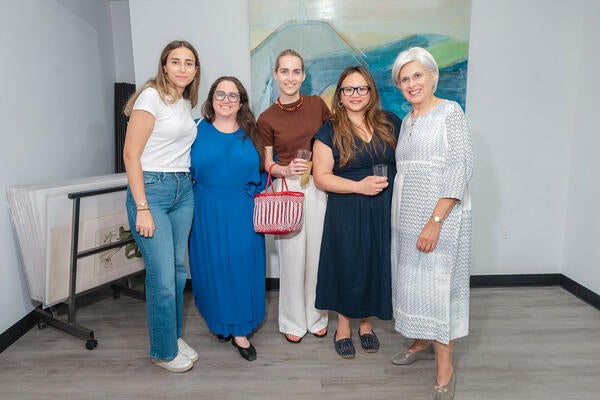From right: Robyn Pocker and Hildy Ng-Strasser with Young Huh’s team 