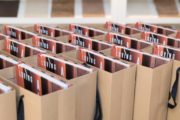 Gift bags with a copy of Sandra Jordan’s book, Loving Alpaca