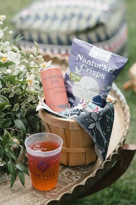 Picnic baskets lined with fabric from The Vale London and filled with treats from local sponsors