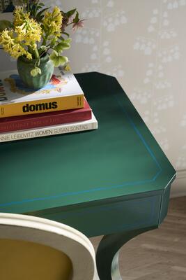 The Carolyn desk pairs graceful curves and neoclassical symmetry with sculptural presence
