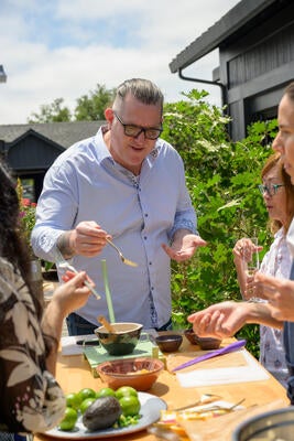 Gabe Connolly of South Bay Paints participates in the chef-led culinary experience, one of the afternoon’s interactive highlights