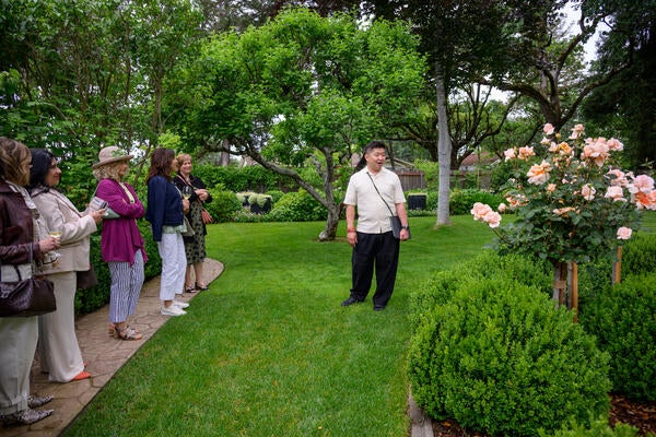 Jiun Ho guides guests through the gardens of Nagomi
