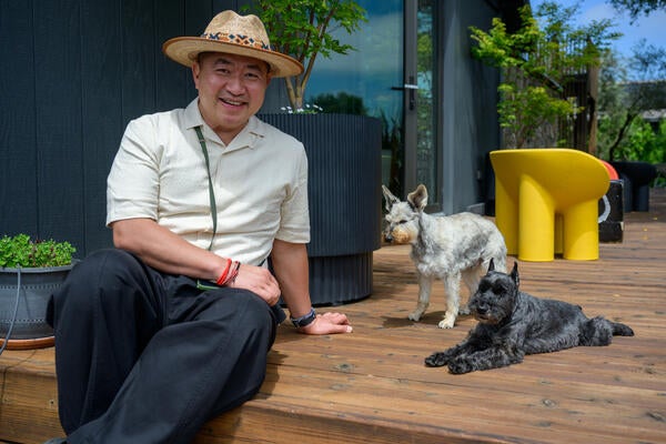 Jiun Ho with Nagomi’s four-legged residents—HRH Eddie the God of Universe and Lord Macallister God in Waiting—welcome guests to an afternoon of design, color and community