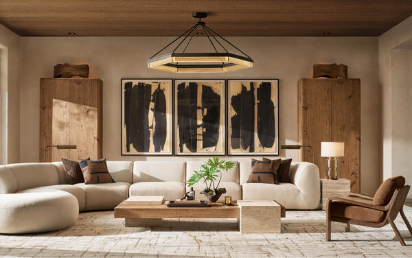 Pietrasanta sectional in natural performance boucle shown with the Bardi coffee table