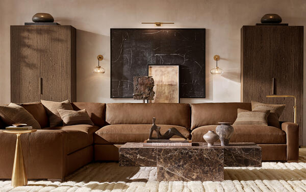 Maxwell sectional in Cocoa Italian Cavallino leather shown with the Cassius coffee table