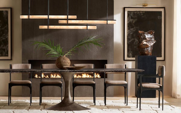 Aero stone dining table in Black Emperador marble with Lira dining chairs