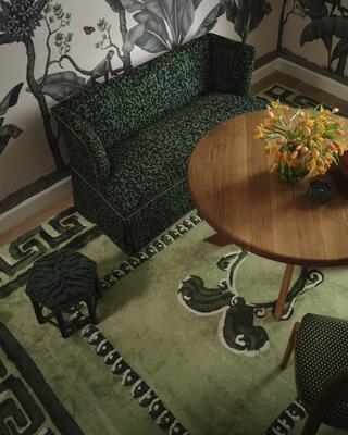 Hand-painted Faux Tapis brings playful trompe l’oeil to the floor in Emerald