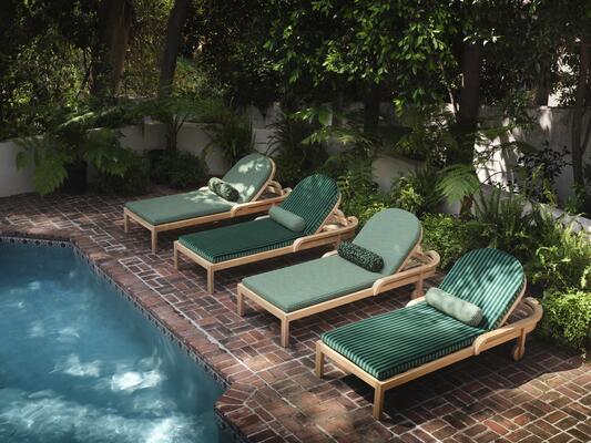 Highball and Club Stripe come together on the Trellis armless chaise for a playful mix
