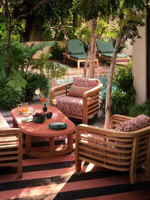 Trellis lounge chairs layer Untamed in Desert Rose and Highball in Sunset over Rusty Film Stripe