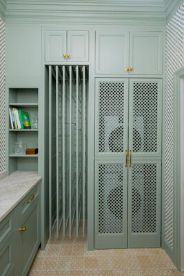 Laundry install of custom Margaret cabinets in Fog paint color