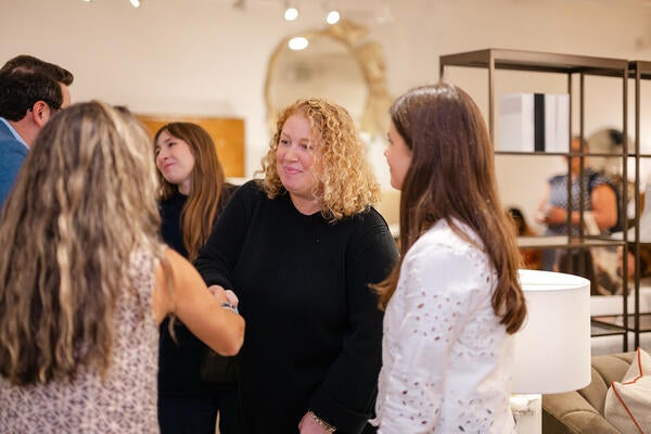 Blair Moore connecting with guests