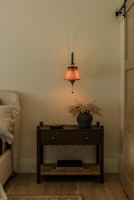 James nightstand and Diane sconce pair effortlessly in a bedroom